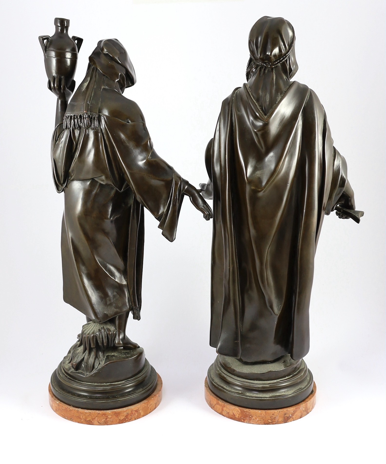 After Jean Jules Samson (1823-1902). A pair of 20th century Continental bronze figures of an Arab warrior and a watercarrier, 67cm high